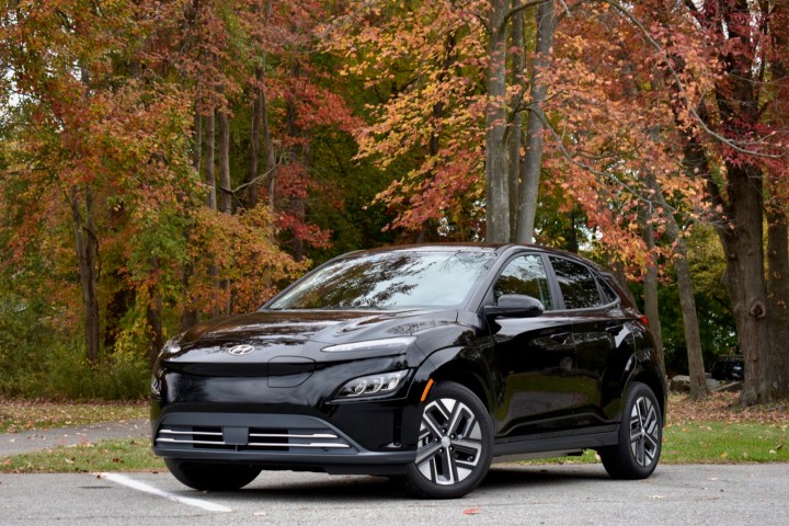 alt text: A 2022 Hyundai Kona Electric parked on a street.