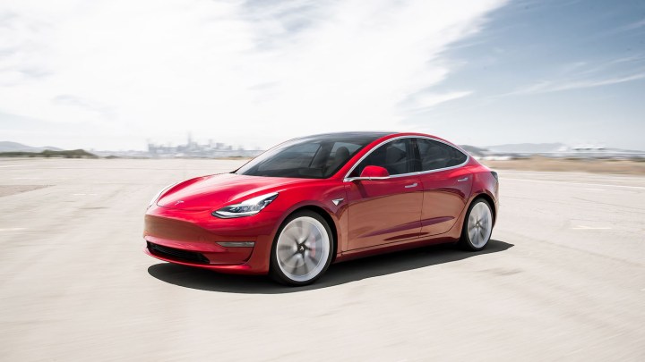 alt text: A Tesla Model 3 electric car.