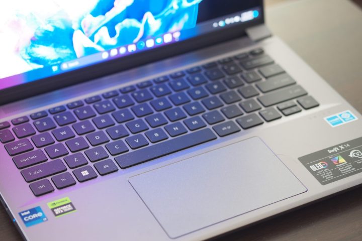 Acer Swift X 14 top down view showing keyboard and touchpad.