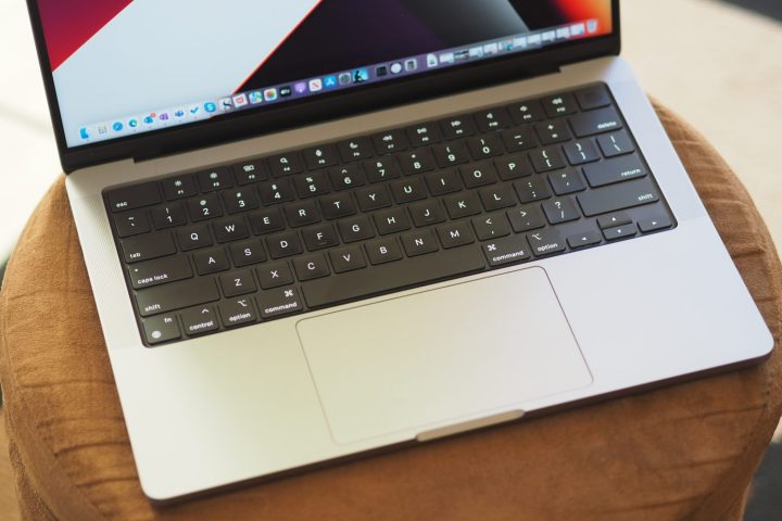 Apple MacBook Pro 14 top down view showing keyboard and touchpad.