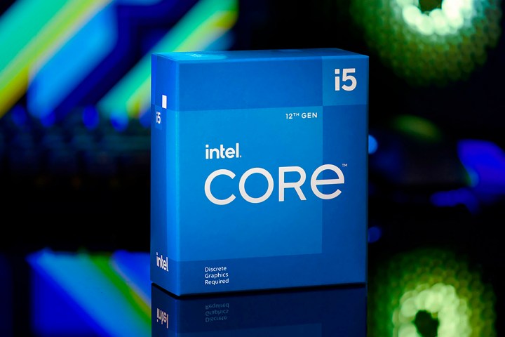 Intel Core i5-12400F box sitting in front of a gaming PC.