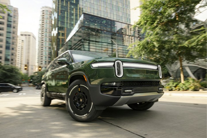 Alt: A second-generation Rivian R1S electric SUV showcasing its interior and exterior.