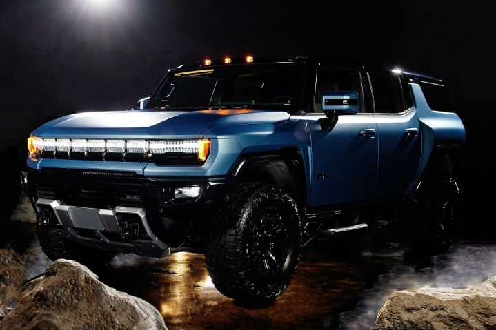 Alt: A GMC Hummer EV Omega Edition electric SUV showcasing its rugged design.