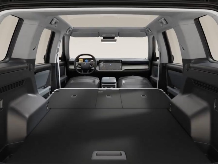 alt: Interior view of the Rivian R2 highlighting its dashboard and seats.