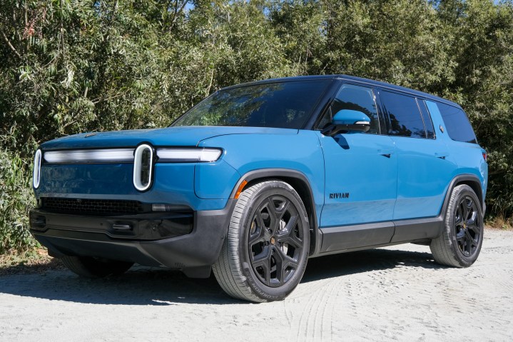 alt text: The Rivian R1S Gen 2 electric SUV parked in a scenic location.