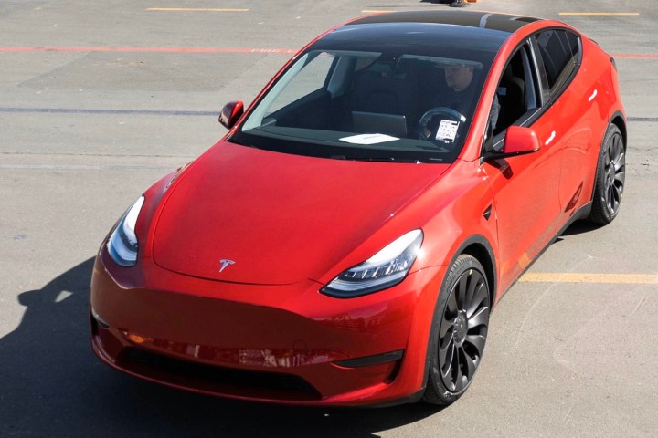 alt text: A Tesla Model Y, celebrating the production of the one-millionth Model Y, is displayed.