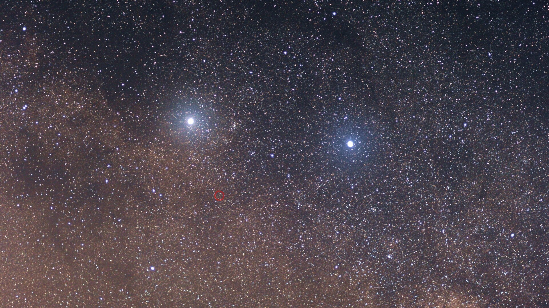 Alpha and Beta Centauri, with Proxima Centauri circled in red.