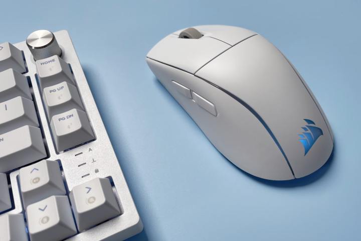 The Corsair K65 Plus for Mac keyboard and the Corsair M75 for Mac mouse against a blue background.