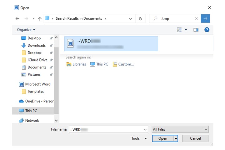 alt text: Screenshot of File Explorer showing a .tmp file in the Documents folder.