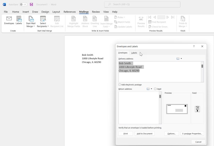 A screenshot of the Mailings tab in Word with the Envelopes option highlighted. Alt: Navigating to the Envelopes option within the Mailings tab in Microsoft Word.