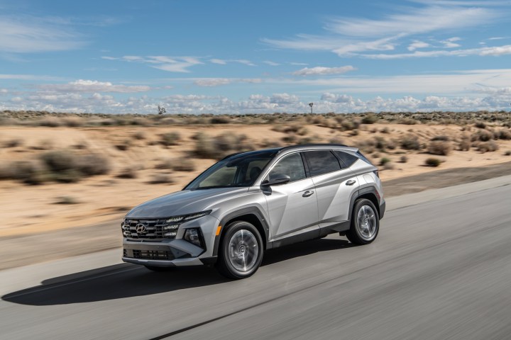 2025 Hyundai Tucson Plug-In Hybrid driving on a road.