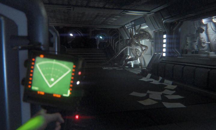 Ripley looking at an alien with a motion tracker in Alien: Isolation.