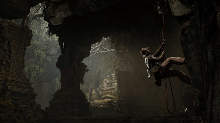 Indiana Jones rappels into a tomb in Indiana Jones and the Dial of Destiny.