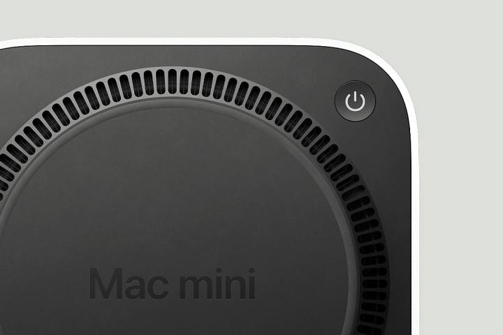 alt=The underside of the Apple M4 Mac mini, showing the relocated power button and vent.