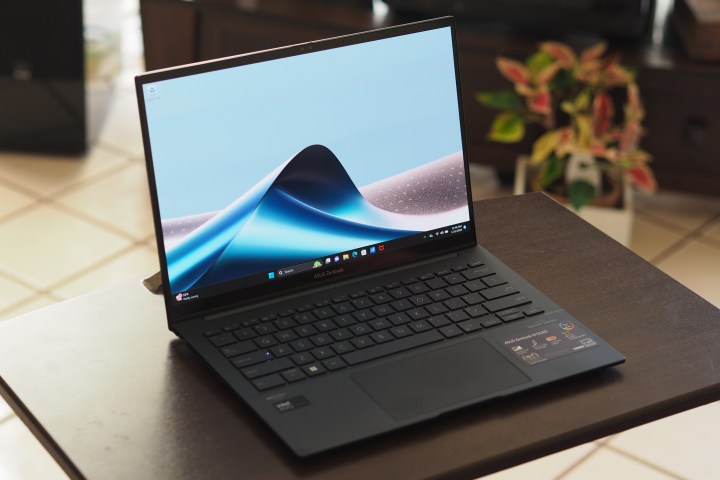 alt text: The Asus Zenbook 14 OLED 2024, showcasing its sleek design and keyboard.