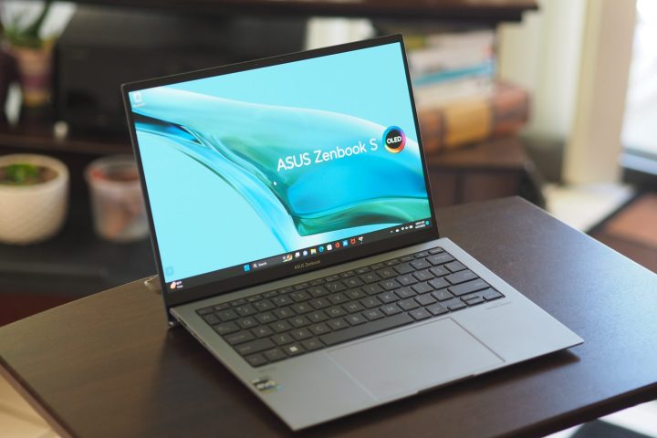 alt text: The Asus Zenbook S 13 OLED (2023) open and angled, showcasing the display and keyboard.