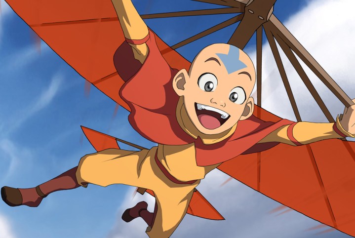 Aang smiling while gliding.