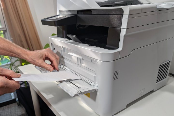 The MFC-L3720CDW's media tray makes it easy to print a single envelope.