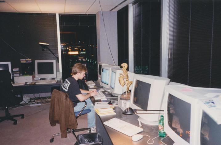 John Carmack working on Quake in the id Software offices.