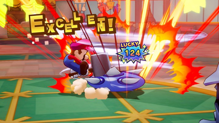 Mario smashes a spikey enemy with a hammer in Mario & Luigi: Bowser's Inside Story.