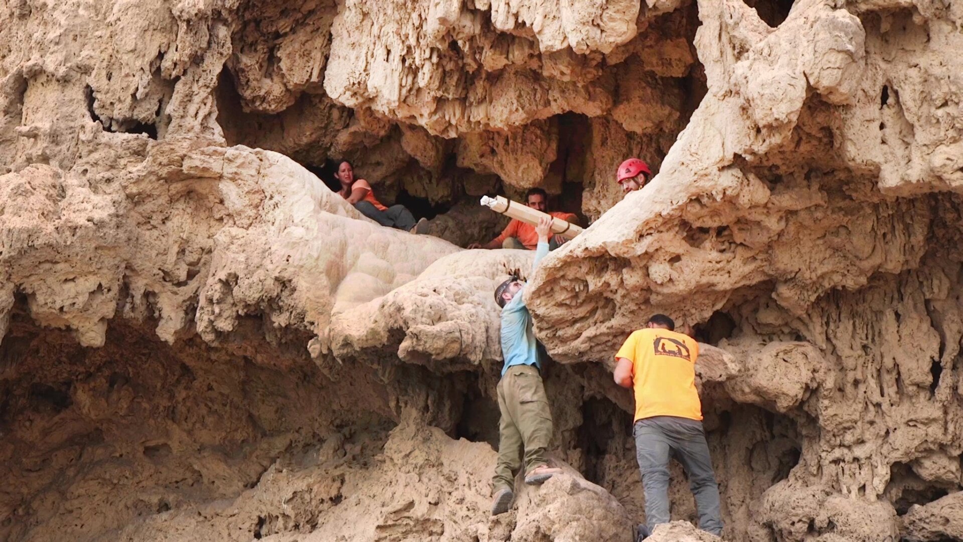 Removing the weapons from the cave.