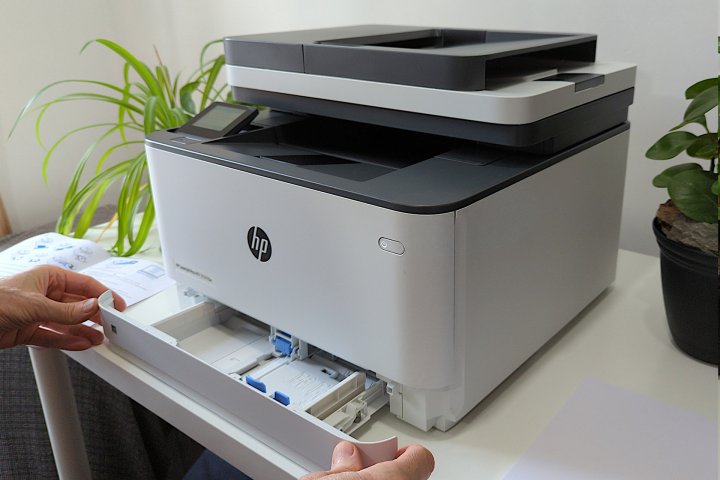 Inserting paper into the LaserJet Pro MFP 3101fdw.