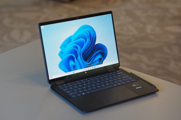 alt: Front view of the HP Spectre x360 14 (2024) showcasing its display and keyboard.