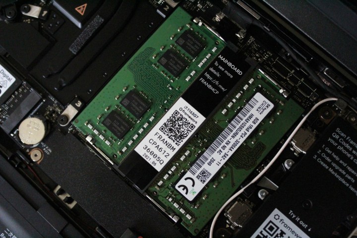 alt text: Close-up view of expandable RAM slots in a laptop