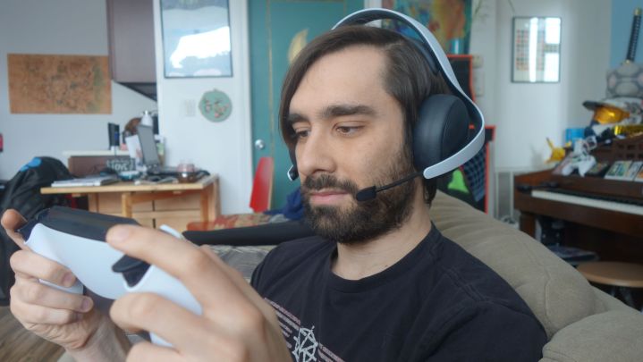 A man wears a Pulse Elite headset.