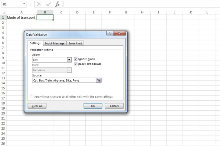 Manually entering data into the Source field for a drop-down list on Microsoft Excel.