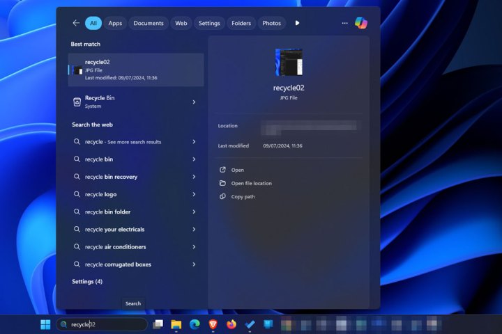 Finding the recycle bin in Windows 11.
