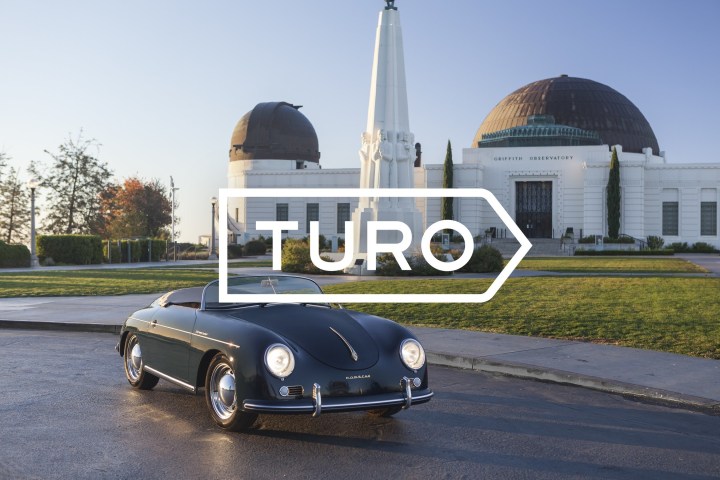 alt text: A silver car parked on a residential street, ready for Turo rental.