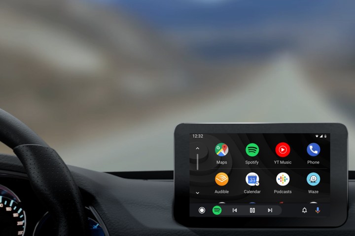 alt text: A phone displaying the Android Auto interface