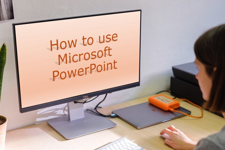 alt: An image showing how to use Microsoft PowerPoint on a monitor with various menus and options displayed.