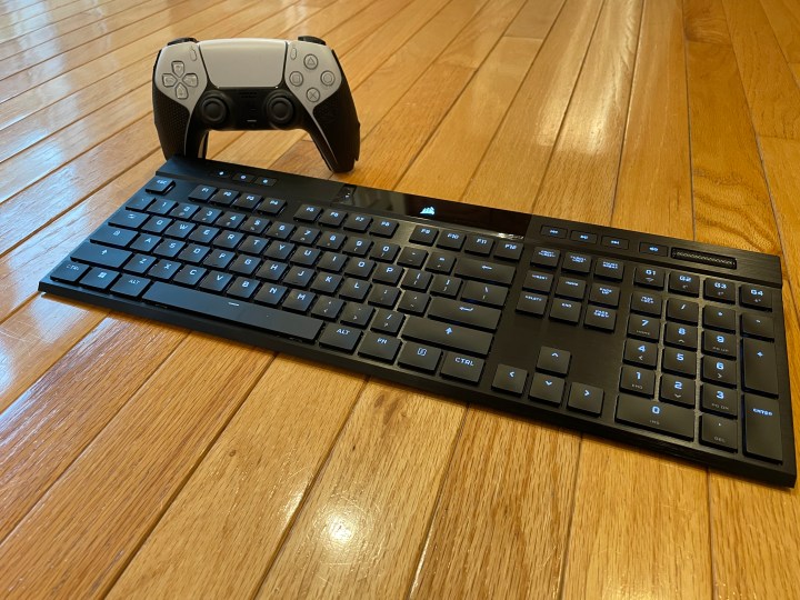 Corsair K100 Air gaming keyboard with PS5 remote.