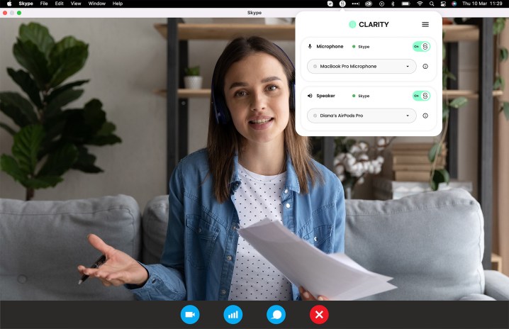 alt text: A person participating in a video call using Iris Clarity.