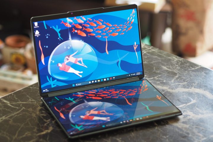 alt: Lenovo Yoga Book 9i dual screens angled view.