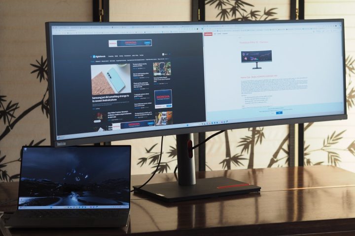 alt: Front angled view of the Lenovo ThinkVision P49w-30, showcasing its expansive screen and sleek stand.