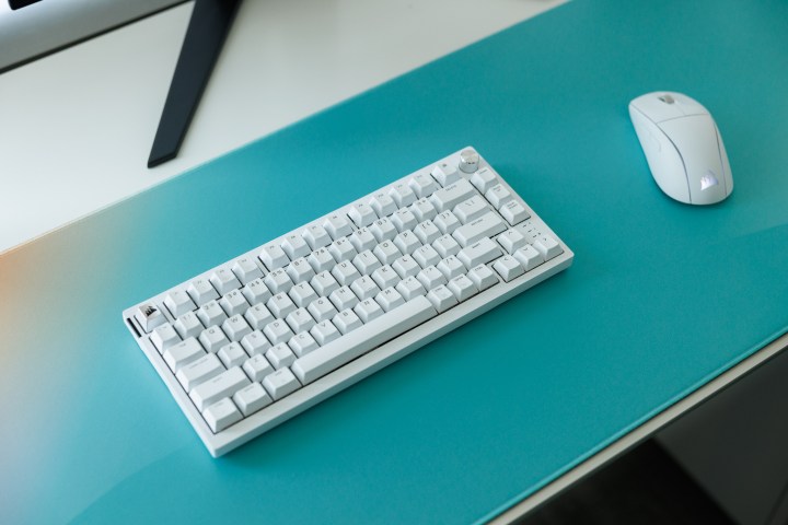 The Corsair M75 and K65 sitting on a desk.