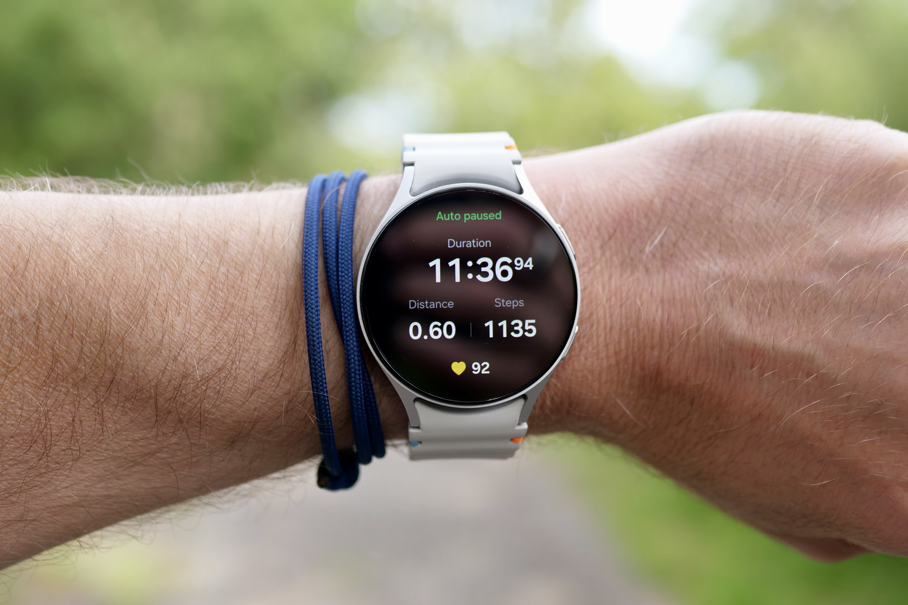 A person wearing the Samsung Galaxy Watch 7, showing workout data.