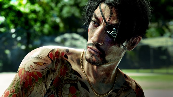 Goro Majima with no shirt on and an eye patch on a beach.