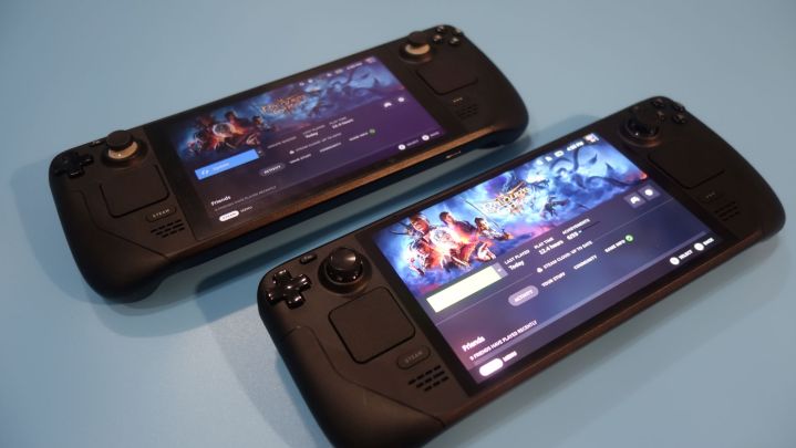 A Steam Deck and Steam Deck OLED sit next to one another.