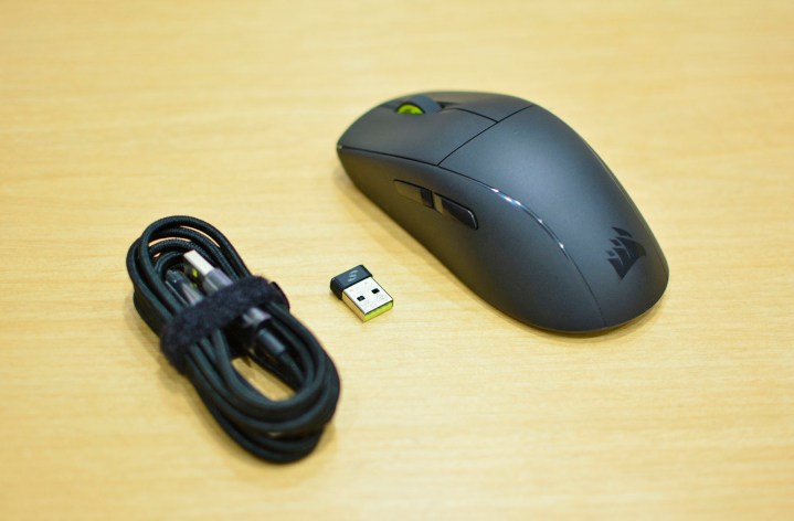 The Corsair M75 Air wireless gaming mouse with the bundled accessories.