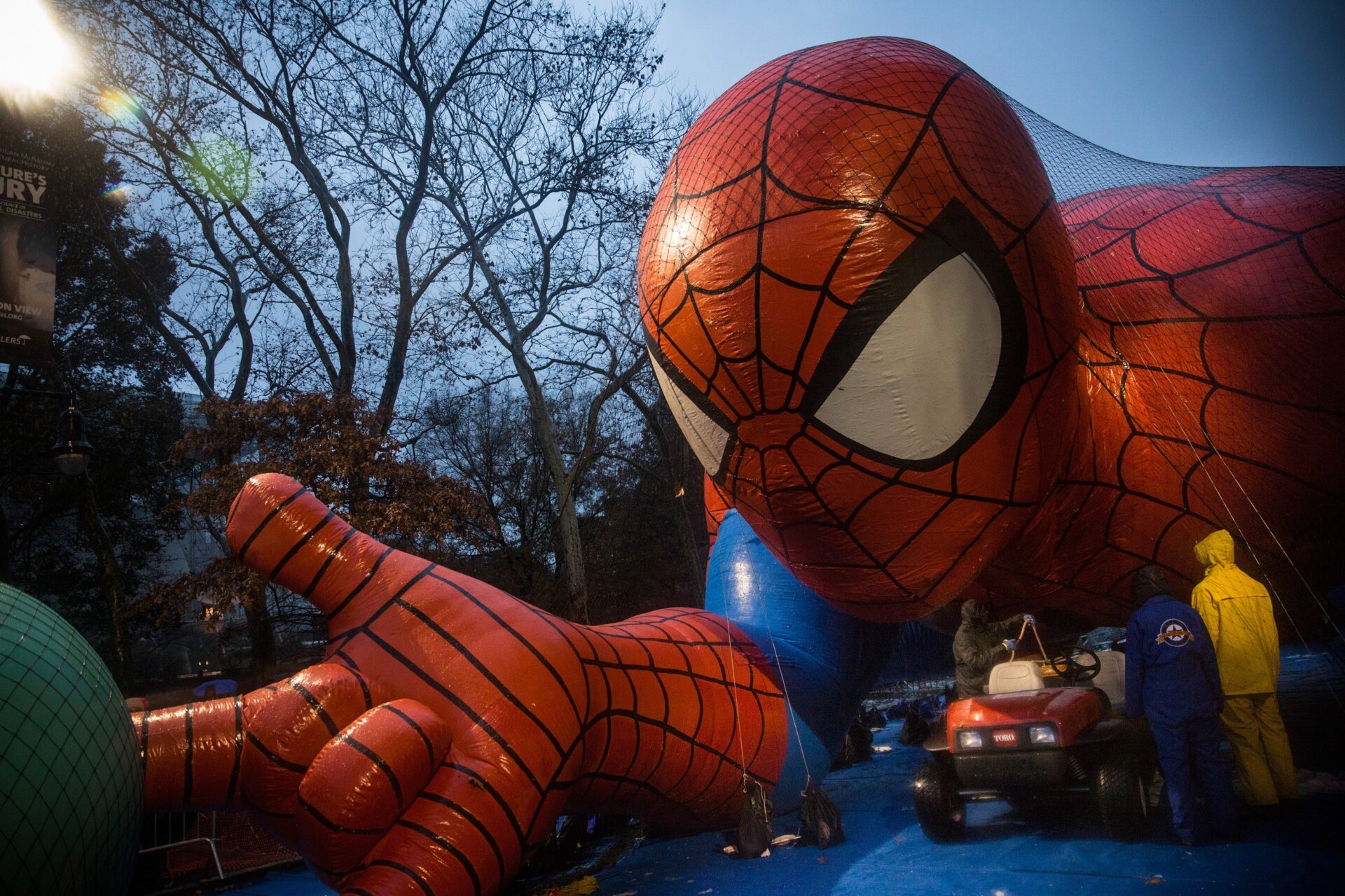 An 80-foot-long inflatable superhuman is pinned to the ground on Manhattan’s Upper West Side.