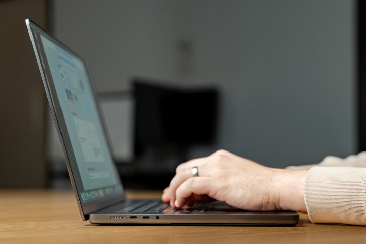 alt text describing the side profile of a macbook pro, hinting at the advanced technology of the m5 chip