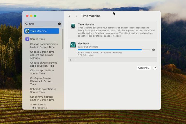 Time Machine Settings are open on a MacBook Air with an external SSD.