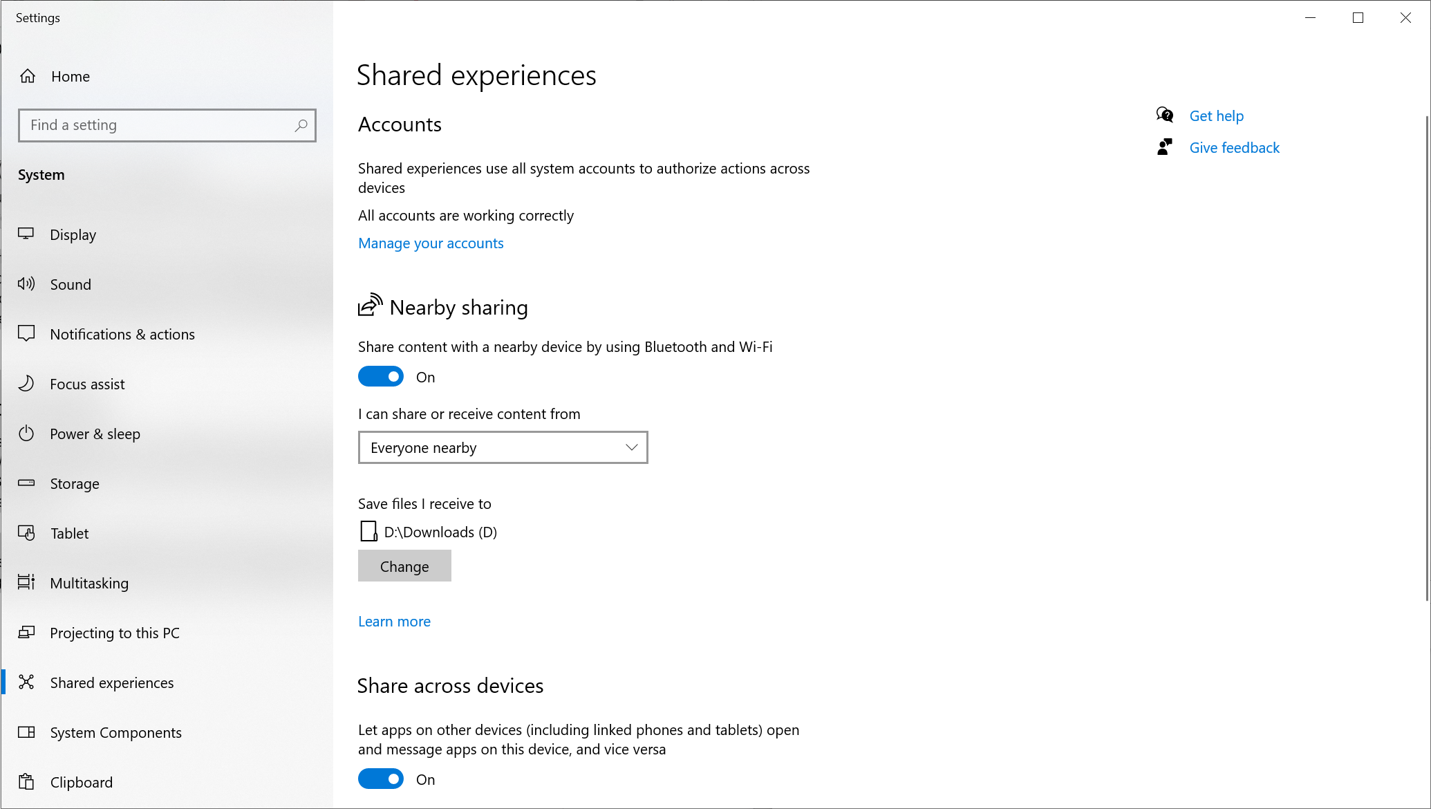 Nearby Sharing settings in Windows 10 (left) and Windows 11 (right).