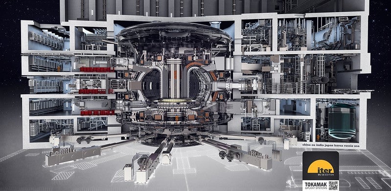 A mockup of the ITER tokamak and its integrated systems.