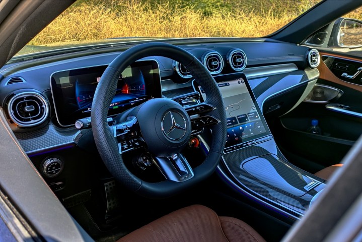 alt text: The interior of the 2025 Mercedes-AMG C63 S E Performance showcasing its luxurious design and advanced technology features.