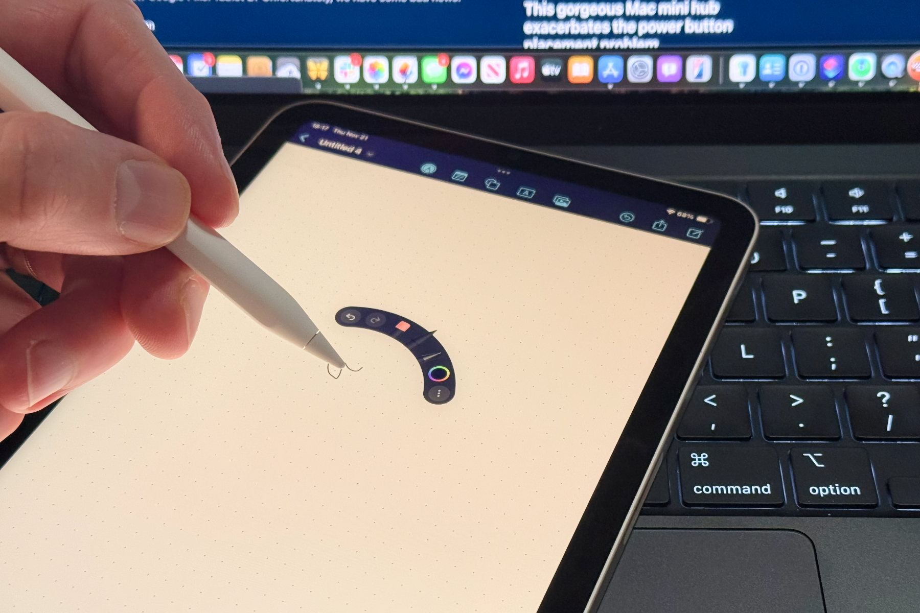 An Apple Pencil Pro being held in a person